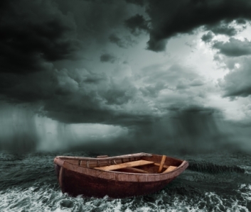 25225309 - old boat in the stormy ocean